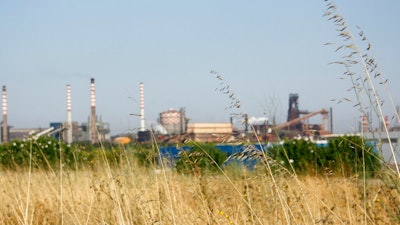 This Aug. 17, 2012 file photo shows a steel plant in Taranto, southern Italy. Worried about big job losses, Italy’s government met Wednesday, Nov. 6, 2019, with Indian steel baron Lakshmi Mittale and other company executives to try and convince ArcelorMittal, the world's largest steelmaker, not to pull out of a deal to acquire the steel plant in southern Italy.