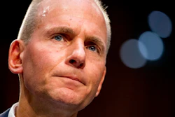 In this Oct. 29, 2019, file photo Boeing Company President and Chief Executive Officer Dennis Muilenburg appears before a Senate Committee on Commerce, Science, and Transportation hearing on 'Aviation Safety and the Future of Boeing's 737 MAX' on Capitol Hill in Washington. Boeing’s new chairman gave Muilenburg a vote of confidence Tuesday , Nov. 5, and said the chief executive is giving up any bonus this year.