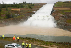 In this April 2, 2019, file photo, water flows down the Oroville Dam spillway in Oroville, California.