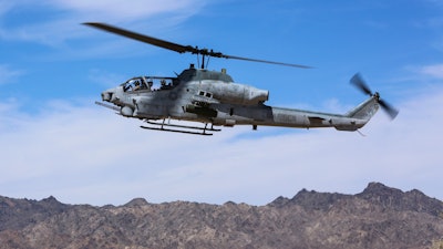 In this April 17, 2017 file photo released by U.S. Marine Corps, an AH-1Z Viper prepares to land at the Chocolate Mountain Aerial Gunnery Range, California.