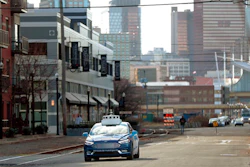 In this Dec. 18, 2018 file photo, one of the test vehicles from Argo AI, Ford's autonomous vehicle unit, navigates through the strip district near the company offices in Pittsburgh. The nation’s road-safety regulator is under fire again for what critics call lax oversight of tests involving autonomous vehicles. The nation’s top transportation safety investigator said Tuesday, Nov. 19, 2019, that the National Highway Traffic Safety Administration doesn’t give enough direction to companies developing more automated cars.