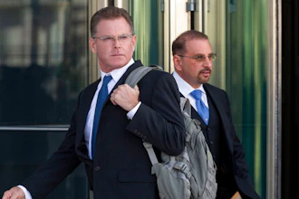 Douglas Haig, left, and his attorney Marc Victor leave the Lloyd George Federal Courthouse, Tuesday Nov. 19, 2019, in Las Vegas, after pleading guilty to illegally manufacturing tracer and armor-piercing bullets found in a high-rise hotel suite where a gunman took aim before the Las Vegas Strip massacre two years ago. Haig is a 57-year-old aerospace engineer who used to reload bullets at home in Mesa, Airz., and sell them at gun shows. He isn’t accused of a direct role in the Oct. 1, 2017, shooting that killed 58 people and injured hundreds at an open-air music festival.