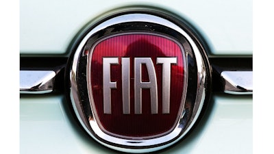 In this Oct. 31, 2019 file photo, a Fiat logo is pictured on a car in Bayonne, southwestern France. The United Auto Workers union has begun to focus bargaining on Fiat Chrysler, raising the possibility of another strike against a Detroit automaker.