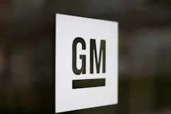 This May 16, 2014, file photo, shows the General Motors logo at the company's world headquarters in Detroit. General Motors is suing Fiat Chrysler, alleging that its crosstown rival got an unfair business advantage by bribing officials of the United Auto Workers union. The lawsuit, filed Wednesday, Nov. 20, 2019, in U.S. District Court in Detroit, alleges that FCA was involved in racketeering by paying millions in bribes to get concessions and gain advantages in three labor agreements with the union.