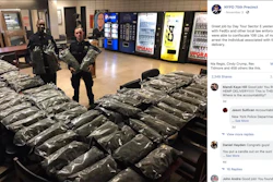 In this undated photo rom the New York Police Department Facebook page, officers stand by what the NYPD thought was marijuana. The Vermont farm that grew the plants and the Brooklyn CBD shop that ordered them insist they're not pot, but legal industrial hemp.