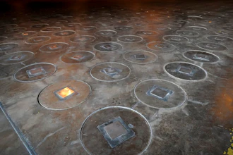 In this Nov., 20, 2013, file photo, radioactive waste, sealed in large stainless steel canisters, are stored under five-feet of concrete in a storage building at the Savannah River Site near Aiken, S.C. The federal government is arguing that it has already promised no more weapons-grade plutonium will be sent to Nevada, and the state lacks standing to seek a court order to force the Energy Department to remove it. Documents filed late Friday, Nov. 15, 2019 in U.S. District Court in Reno brand as 'conjectural' or 'hypothetical' state complaints that residents are harmed by radiation from material secretly trucked a year ago from South Carolina to Nevada.