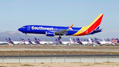 In this March 23, 2019, file photo, a Southwest Airlines Boeing 737 Max aircraft lands at the Southern California Logistics Airport in the high desert town of Victorville, Calif. The union president of Southwest Airlines pilots worries that Boeing may be rushing the 737 Max back into service, and he says Southwest should consider buying planes from another company. The union president, Jon Weaks, adds that Boeing has exhibited arrogance and greed that will haunt the company forever.