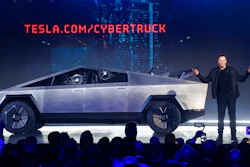 In this Thursday, Nov. 21, 2019, file photo, Tesla CEO Elon Musk introduces the Cybertruck at Tesla's design studio in Hawthorne, Calif. Tesla has received nearly 150,000 orders for its new electric pickup truck since the automaker revealed the futuristic vehicle earlier this week to mixed reviews, Musk tweeted Saturday, Nov. 23.