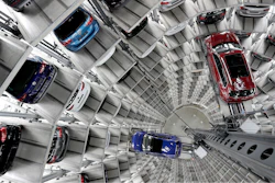 This file photo shows Volkswagen cars lifted inside a delivery tower in Wolfsburg, Germany.