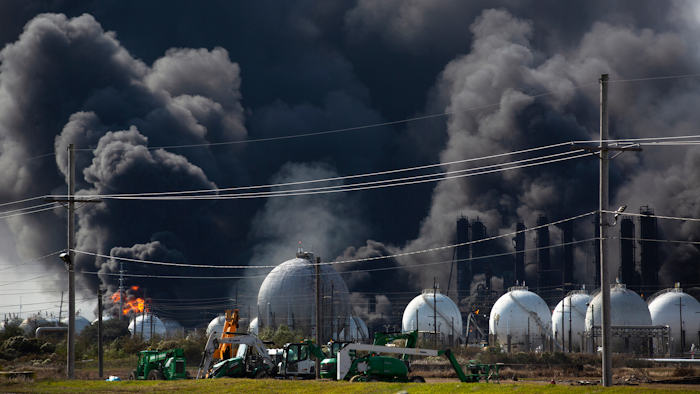 Smoke from an explosion at the TPC Group plant is seen Wednesday, Nov. 27, 2019, in Port Neches, Texas. Two massive explosions 13 hours apart tore through the chemical plant Wednesday, and one left several workers injured.