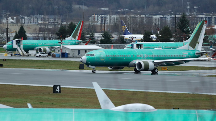 A Boeing 737 Max airplane being built for Norwegian Air International taxis for a test flight, Wednesday, Dec. 11, 2019, at Renton Municipal Airport in Renton, Wash. The chairman of the House Transportation Committee said Wednesday that an FAA analysis of the 737 Max performed after a fatal crash in 2018 predicted 'as many as 15 future fatal crashes within the life of the fleet' during opening remarks at the committee's fifth hearing on the Boeing 737 Max.
