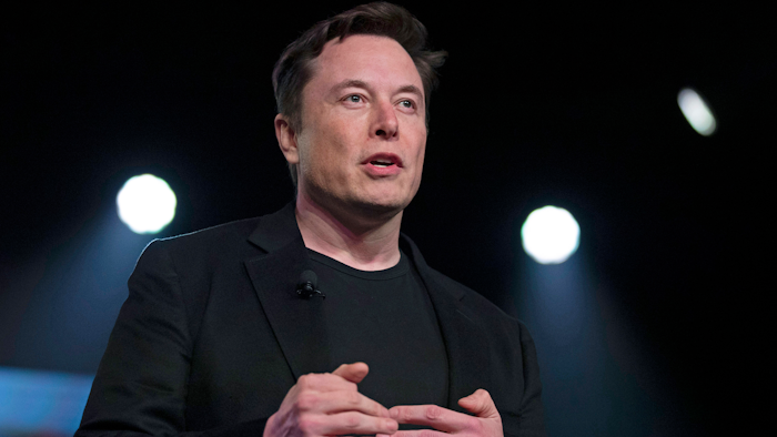 In this March 14, 2019, file photo, Tesla CEO Elon Musk speaks before unveiling the Model Y at Tesla's design studio in Hawthorne, Calif. Musk is going on trial for his troublesome tweets in a case pitting the billionaire against a British diver he allegedly dubbed a pedophile.