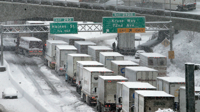 In this Jan. 11, 2017, file photo, early morning traffic at a standstill on Interstate 5 in Portland, Ore.