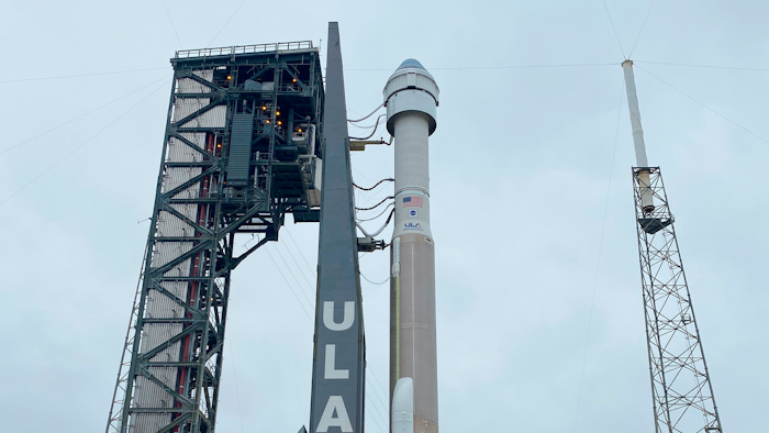 In this photo made available by NASA, Boeing's CST-100 Starliner spacecraft atop a United Launch Alliance Atlas V rocket is rolled out of the Vertical Integration Facility to the launch pad at Space Launch Complex 41 at Cape Canaveral Air Force Station in Florida on Wednesday, Dec. 18, 2019. It is scheduled for liftoff to the International Space Station on Friday.