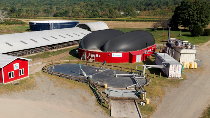 This September 2019 image provided by Vanguard Renewables shows a Farm Powered anaerobic digester facility in Deerfield, Mass. Dominion Energy is launching a $200 million effort to convert methane from cow manure into natural gas.