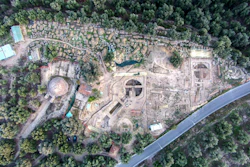 In this undated photo provided by the Greek Culture Ministry on Tuesday, Dec. 17, 2019, an aerial view is seen of two 3,500-year-old tombs, center and right, discovered near the southwestern Greek town of Pylos, together with one found decades ago, left. The ministry said American archaeologists have discovered two monumental royal tombs dating 3,500 years back, near a large Bronze Age palace that featured in Homer's Odyssey. Recovered grave goods included a golden seal ring and a golden Egyptian amulet.