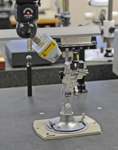 Laser scanning the plastic body of an ABS (automatic braking system) speed sensor using a digital laser scanner.