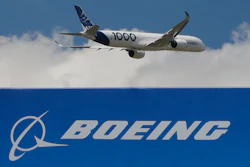 In this June 17, 2019, file photo, an Airbus A 350 - 1000 performs his demonstration flight at Paris Air Show in Le Bourget, east of Paris, France. Boeing's grounded 737 Max got a boost from two orders in November, but the American aircraft company continues to trail Europe's Airbus in both orders and deliveries of airline planes. Boeing disclosed Tuesday, Dec. 10, that it received 11 net orders in November, 63 new orders but 52 cancellations.