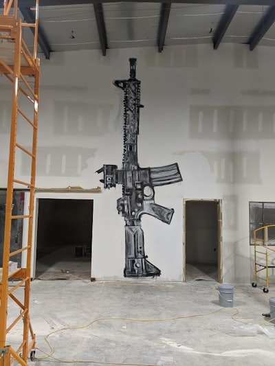 Mural of a firearm in the new building.