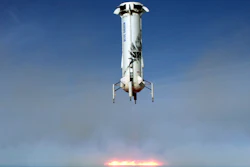 In this image provided by Blue Origin, the New Shepard rocket booster lands near Van Horn, Texas. Blue Origin, Jeff Bezos' space company, has scored another successful spaceflight, when it launched and landed the same rocket for the sixth time Wednesday.