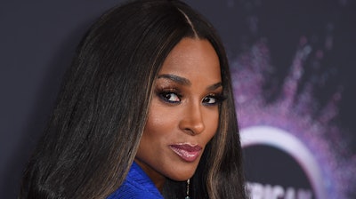 In this Nov. 24, 2019, file photo, Ciara arrives at the American Music Awards at the Microsoft Theater in Los Angeles. Recording artist Ciara returned to the city where she launched her career to surprise students at an Atlanta-area STEM high school on Monda, Dec. 16, 2019. The R&B artist sat in on a class with students at Paul Duke Stem High, a Norcross school which focuses on science, technology, engineering and math education. Students there have been using computer coding skills to remix her songs such as “Melanin”and “Set.”