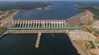 The Belo Monte hydroelectric dam stands in the Xingu River in Altamira, Para state, Brazil, Friday, Sept. 6, 2019. With the start of full-scale operations three weeks ago, debate over its legacy, and whether its construction was worth local sacrifice, is coming into focus.