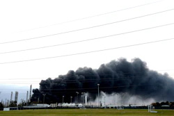 Thick smoke following an overnight explosion, Nov. 27, 2019, in Port Neches, Texas.