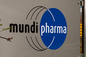 This Dec. 12, 2019, photo shows a sign at the Mundipharma International headquarters at Cambridge Science Park in England. Mundipharma is the international affiliate of Purdue Pharma, the maker of the blockbuster painkiller OxyContin. Mundipharma is now marketing Nyxoid, a new brand of naloxone, an opioid overdose reversal medication.