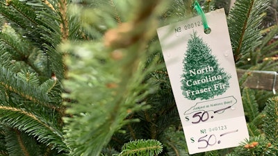 In this Monday, Dec. 9, 2019, photo, a North Carolina fraser fir Christmas tree is for sale in Lenoir, N.C. A Christmas tree shortage is being blamed on the Great Recession. Poor sales a decade ago, limited the number of trees planted, which are being harvested this year.