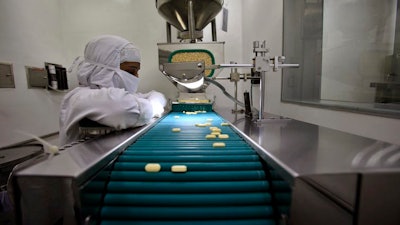 A pharmacist at a drug plant outside Mumbai in 2012, shortly after a change in patent law allowed production of a generic cancer drug.