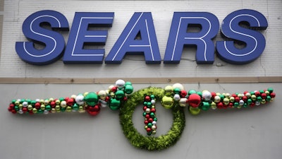 This Jan. 8, 2019, file photo shows a Sears store is seen in Hackensack, N.J. Nine months out of bankruptcy, Sears is limping into the holiday shopping season.