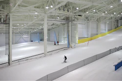 Snowboarders and skiers enjoy the grand opening of Big Snow in East Rutherford, N.J., Thursday, Dec. 5, 2019. The facility, which is part of the American Dream mega-mall, is North America's first indoor ski and snowboard slope with real snow.