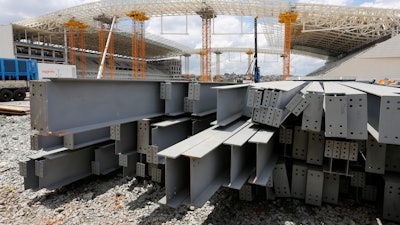In this Dec. 8, 2013 file photo, steel beams sit outside Arena de Sao Paulo in Sao Paulo, Brazil. President Donald Trump on Dec. 2, 2019 accused Brazil and Argentina of hurting American farmers through currency manipulation and said he’ll slap tariffs on their steel and aluminum imports to retaliate.