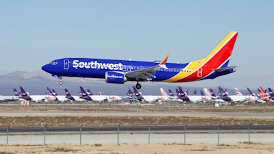 In this March 23, 2019, file photo, a Southwest Airlines Boeing 737 Max aircraft lands at the Southern California Logistics Airport in the high desert town of Victorville, Calif. The union president of Southwest Airlines pilots worries that Boeing may be rushing the 737 Max back into service, and he says Southwest should consider buying planes from another company. The union president, Jon Weaks, adds that Boeing has exhibited arrogance and greed that will haunt the company forever.