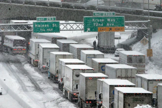 In this Jan. 11, 2017, file photo, early morning traffic at a standstill on Interstate 5 in Portland, Ore.