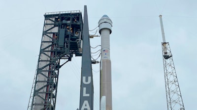 In this photo made available by NASA, Boeing's CST-100 Starliner spacecraft atop a United Launch Alliance Atlas V rocket is rolled out of the Vertical Integration Facility to the launch pad at Space Launch Complex 41 at Cape Canaveral Air Force Station in Florida on Wednesday, Dec. 18, 2019. It is scheduled for liftoff to the International Space Station on Friday.