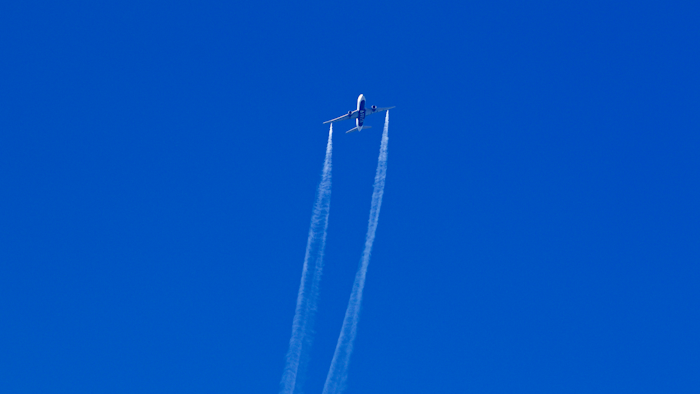 In this photo from video, Delta Air Lines Flight 89 to Shanghai, China, dumps fuel over Los Angeles before returning to Los Angeles International Airport for an emergency landing Tuesday, Jan. 14, 2020. Fuel dumped by the airliner making an emergency return Tuesday to the airport due to an engine problem fell onto three schools, causing minor irritation to 40 children and adults, officials said.