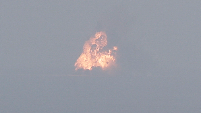 A Falcon 9 SpaceX rocket explodes as it crashes in the Atlantic Ocean off the coast of the Kennedy Space Center in Cape Canaveral, Fla., during a test flight to demonstrate the capsule's emergency escape system Sunday, Jan. 19, 2020.