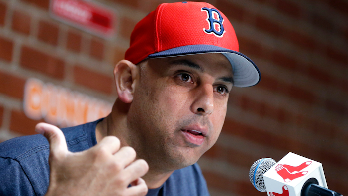 In this Sept. 9, 2019, file photo, Boston Red Sox manager Alex Cora talks about the dismissal of president of baseball operations Dave Dombrowski, during a news conference before the team's baseball game against the New York Yankees in Boston. Cora was fired by the Red Sox on Tuesday, Jan. 14, 2020, a day after baseball Commissioner Rob Manfred implicated him in the sport's sign-stealing scandal.
