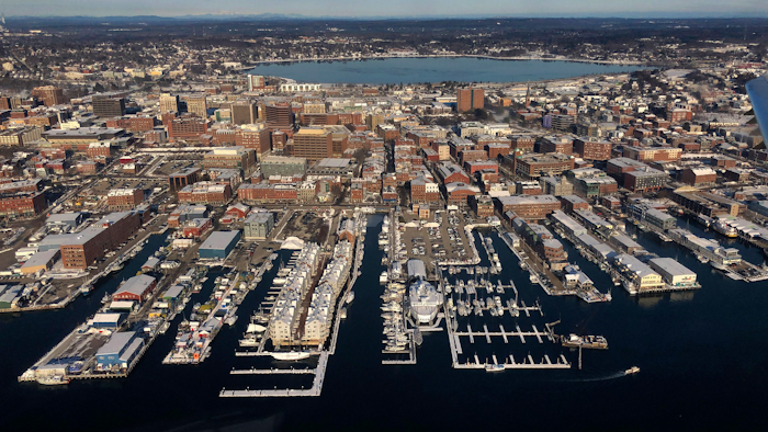 This file photo shows the waterfront in Portland, Maine. The Commerce Department recently issued the first estimate of how the U.S. economy performed in the fourth quarter.