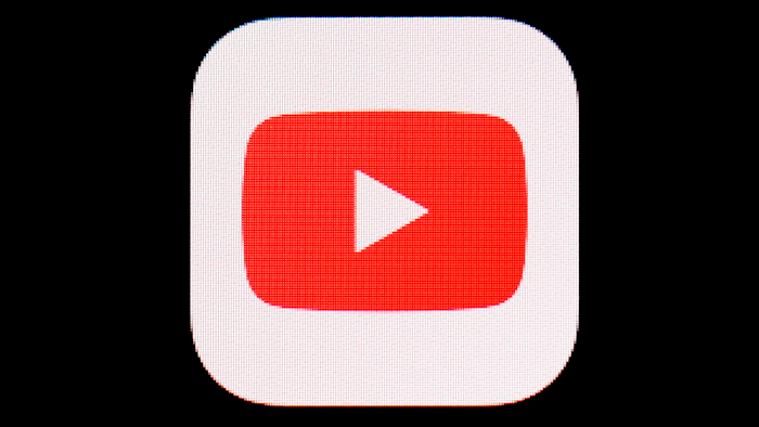 This March 20, 2018, file photo shows the YouTube app on an iPad. YouTube's trust and safety team is tasked with deciding what the video site allows to reach its enormous audience, and what gets taken down. Team leader Matt Halprin constantly has to balance safety and civility with what the company considers a core mission: freedom of expression.