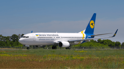 In this photo taken on Saturday, May 26, 2018, showing the actual Ukrainian Boeing 737-800 UR-PSR plane that crashed Wednesday Jan. 8, 2020, on the outskirts of Tehran, Iran, seen here as it waits to takeoff at Borispil international airport outside Kyiv, Ukraine. This Ukrainian airplane carrying 176 people crashed on Wednesday shortly after takeoff from Tehran's main airport, killing all onboard, Iranian state TV and officials in Ukraine said.