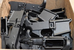 This photo provided by the U.S. Department of Justice shows AR-15 lower receivers, which federal agents have seized, including these unfinished ones taken in 2014 in California, for firearms investigations nationwide. For decades, the federal government has treated the mechanism called the lower receiver as the essential piece of the semiautomatic rifle, which has been used in some of the nation's deadliest mass shootings. But some defense attorneys have recently argued that the part alone does not meet the definition in the law.