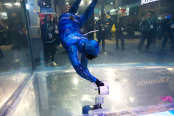 A Sublue diver moves around with the Sublue WhiteShark Mix outfitted with dual propellers for power and balance shown at their water tank booth during the CES tech show Wednesday, Jan. 8, 2020, in Las Vegas.