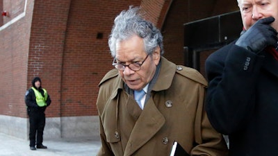 In this Jan. 30, 2019, file photo, Insys Therapeutics founder John Kapoor leaves federal court in Boston. Kapoor and former top employees of the pharmaceutical company are facing a reckoning for their role in a bribery scheme that prosecutors say boosted sales of a powerful, highly addictive painkiller and helped fuel the national opioid epidemic.Starting Monday, Jan. 13, 2020, seven people who worked for Insys Therapeutics will appear in Boston to be sentenced by a federal judge.