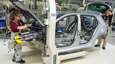 Picture taken May 14, 2019 shows complete Golf car bodies at the assembly line during a press tour of the plant of the German manufacturer Volkswagen AG (VW) in Zwickau, Germany. The first ID. production electrical vehicles are to roll off the assembly line at the end of 2019. Only e-cars will be built at Zwickau in 2021.