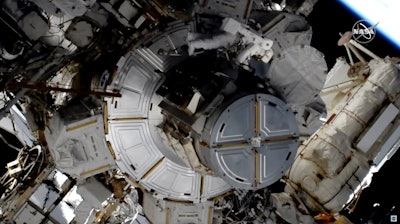 In this image taken from NASA video NASA astronaut Jessica Meir works to finish upgrading the International Space Station's power grid, Wednesday, Jan. 15, 2020. NASA is in the midst of replacing decades-old nickel-hydrogen batteries outside the sprawling space station with more powerful, longer-lasting lithium-ion batteries. The batteries are part of the station's solar power network, keeping everything running when the outpost is on the night side of Earth. It was the second pairing of Meir and Christina Koch outside the orbiting lab.