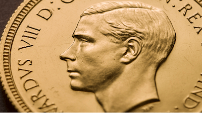 In this undated photo made available by The Royal Mint, a view of a rare Edward VIII Sovereign coin. One of the world's most rare coins featuring the uncle of Britain's Queen Elizabeth II, has been purchased for 1 million pounds ($1.3 million) in a new record for the sale of a British coin. The historical oddity shows King Edward VIII before he abdicated the throne in 1936 in order to marry American divorcee Wallis Simpson. The 22-carat gold coins were never released to the public.