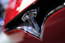 This Sept. 30, 2016, file photo shows the logo of the Tesla model S at the Paris Auto Show in Paris, France. The U.S. government's auto safety agency is looking into allegations that all three of Tesla's electric vehicles can suddenly accelerate on their own. An unidentified person petitioned the National Highway Traffic Safety Administration asking for an investigation into the problem. The agency says the allegations include about 500,000 Tesla Model 3, Model S and Model X vehicles from the 2013 through 2019 model years.