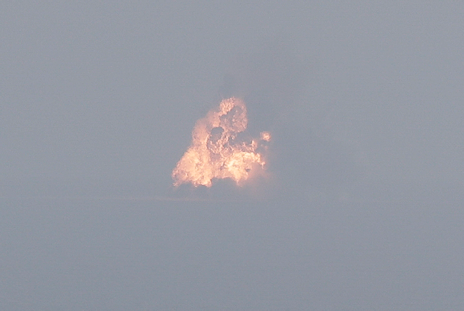 A Falcon 9 SpaceX rocket explodes as it crashes in the Atlantic Ocean off the coast of the Kennedy Space Center in Cape Canaveral, Fla., during a test flight to demonstrate the capsule's emergency escape system Sunday, Jan. 19, 2020.
